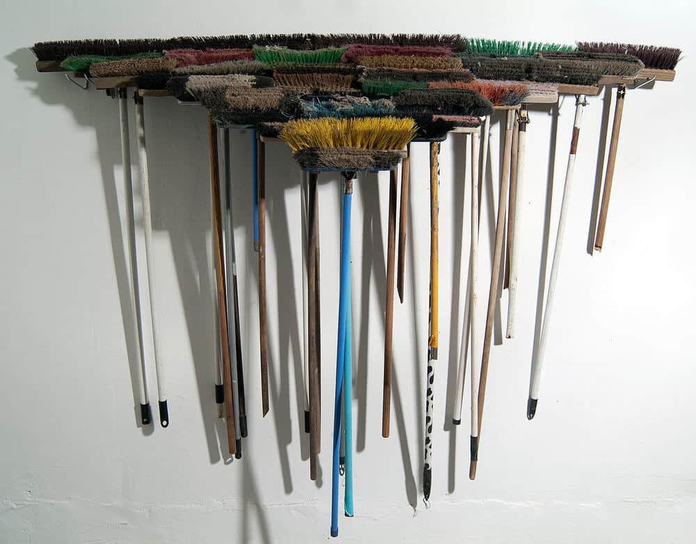 Usha Seejarim, Triangle (2012), Sculpture with brooms, 2100 x 480 x 600 mm. Courtesy of the artist & Friedman Contemporary
